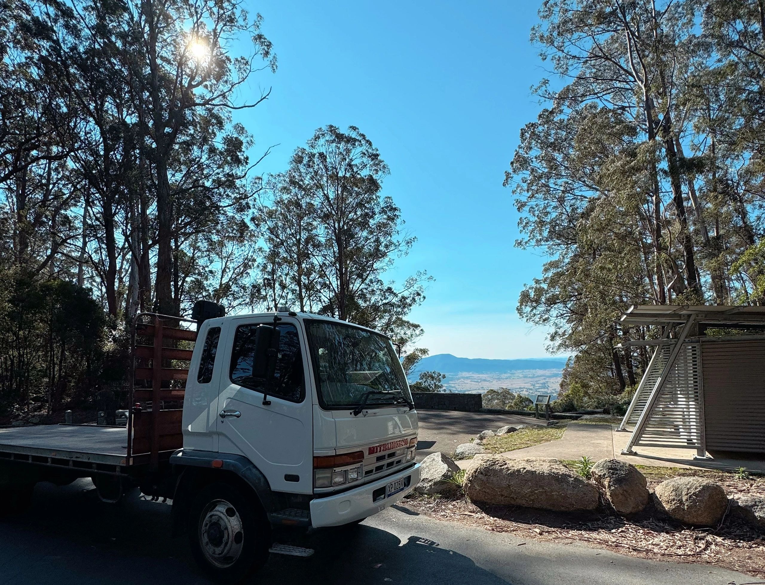 Topping Transport white utility vehicle